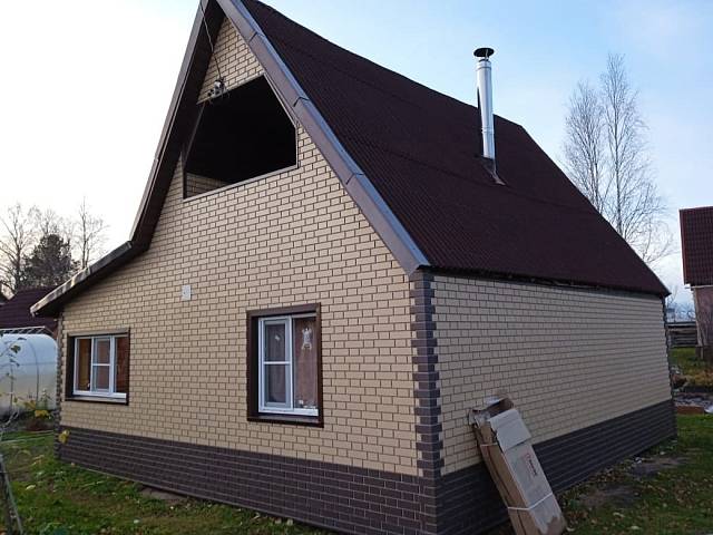 Облицовка дома фасадными панелями в деревне Антоновка